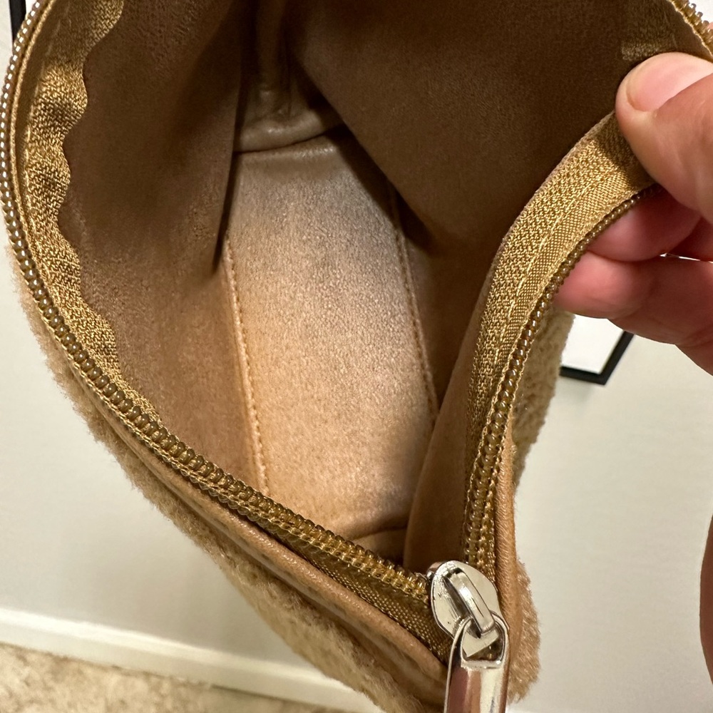 Tote Bag in cream ;Neiman Marcus
Faux Shearling Tote with makeup bag - Picture 8 of 9